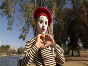 Mime girl and blonde in a porev with guys