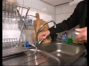 Babe and plumber screwing in the kitchen